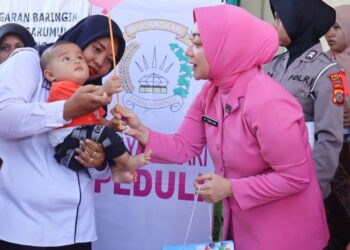 Ketua Bhayangkari Cabang Padang Lawas Laksanakan Imunisasi Posyandu