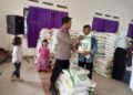 Polsek Panjalu Polres Ciamis Awasi Distribusi Bapanas Beras 10 Kg ke Warga Desa Maparah