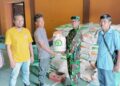 Polsek Sukadana Polres Ciamis Awasi Distribusi Bapanas Beras 10 Kg ke Warga Desa Sukadana