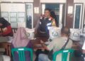 Polsek Cihaurbeuti Giat Monitoring Penyaluran Bantuan Pangan Beras di Desa Sukahurip
