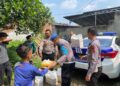 Melalui Jum’at Berkah,Polsek Sukaraja dan Sat Lantas Polres Sukabumi Kota Bagikan Nasi Kotak Gratis