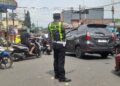 Gatur Lalu Lintas Polsek Warudoyong Paska melintas Kereta Api Pangrango