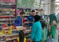 Polsek Sukalarang Sampaikan Himbauan Kamtibmas Kepada Karyawan Minimarket saat Patroli Siang