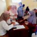 Bhabinkamtibmas Polwan Monitoring Pembagian Bansos Beras