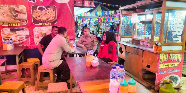 Aktifkan Patroli Pasar malam Polsek Baros ajak pengelola jaga Kondusifitas kamtibmas