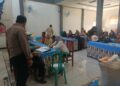 Bhabinkamtibmas Polsek Cisaat Monitoring Penyaluran Program Bantuan Pangan Cadangan Beras Pemerintah (BPCBP)