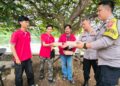 Cooling System Pasca Pilkada Polsek Sukaraja Bagi-bagi Nasi Kotak